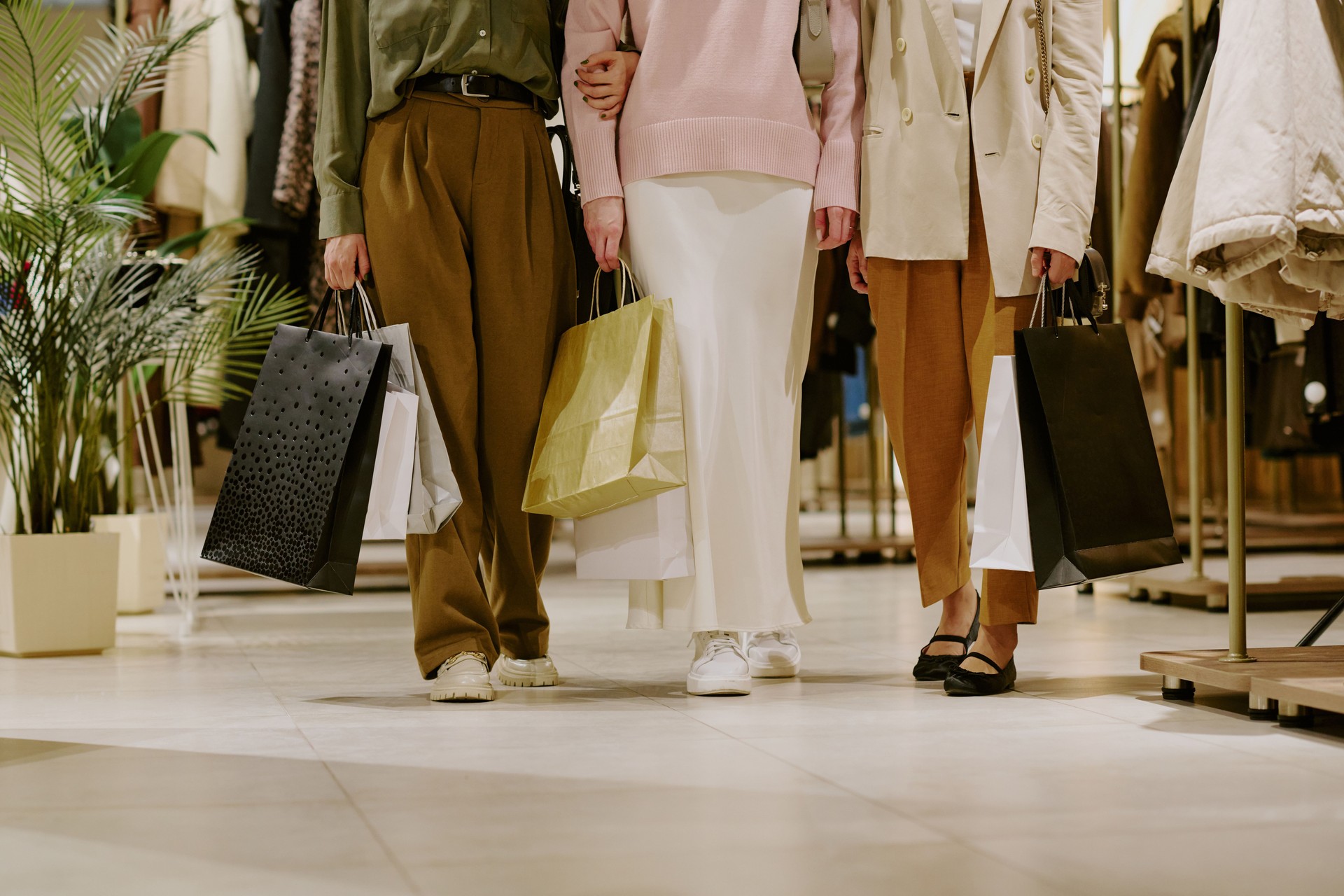 Unrecognizable Fashionistas in Mall